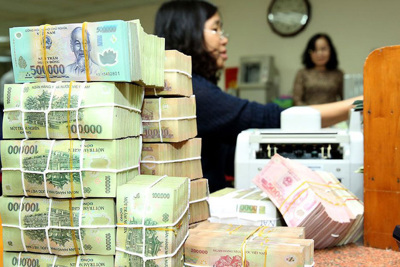 Tiền Việt tăng giá hiếm thấy: Kẻ cười, người khóc