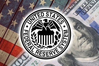 Fed giữ lãi suất ổn định và giảm dần kích thích kinh tế