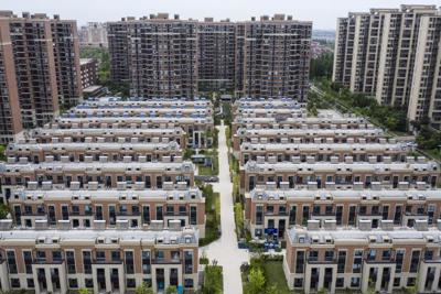  Trung Quốc giảm lãi suất cho vay thế chấp để cứu thị trường địa ốc 
