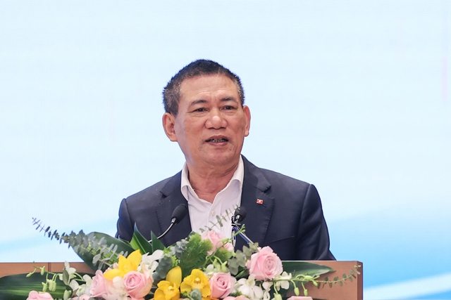 Bộ trưởng Bộ Tài chính Hồ Đức Phớc phát biểu tại hội nghị. Ảnh :VGP/Nhật Bắc