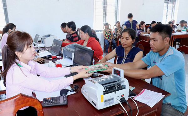 Chất lượng tín dụng tiếp tục được giữ vững, tỷ lệ nợ quá hạn và nợ khoanh duy trì ở mức thấp 0,54% trên tổng dư nợ. Ảnh: NHCSXH