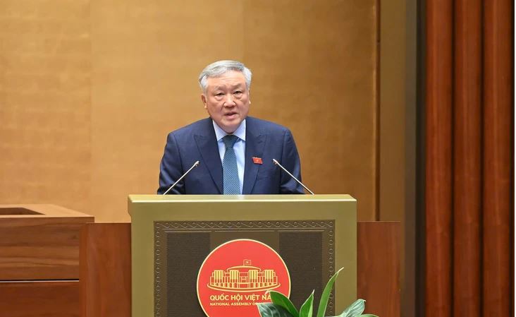 Phó Thủ tướng thường trực Nguyễn Hoà Bình báo cáo trước Quốc hội sáng 20/6.