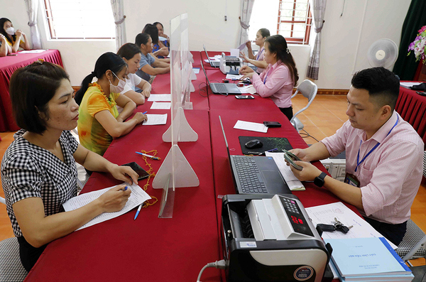 Đa dạng hóa các kênh huy động vốn để thực hiện các chương trình tín dụng chính sách xã hội. Ảnh: NHCSXH