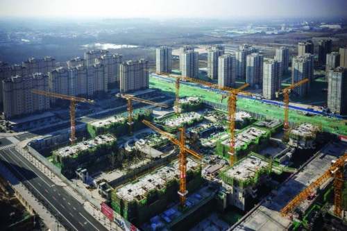 Các tòa nhà chung cư đang được xây dựng ở Thượng Hải, Trung Quốc. Ảnh: REUTERS
