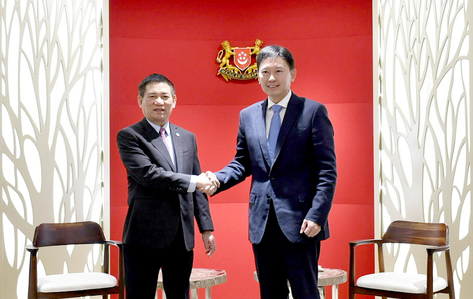 Bộ trưởng Hồ Đức Phớc v&agrave; Bộ trưởng thứ hai, Bộ T&agrave;i ch&iacute;nh Singapore Chee Hong Tat tại buổi l&agrave;m việc s&aacute;ng 5/8.