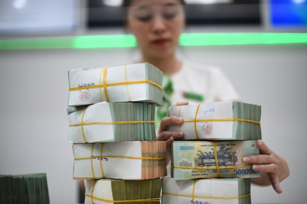 Phát hành gần 2,77 tỷ cổ phiếu thành công vốn điều lệ của Vietcombank sẽ tăng lên gần 83.557 tỷ đồng. Ảnh: Duy Minh