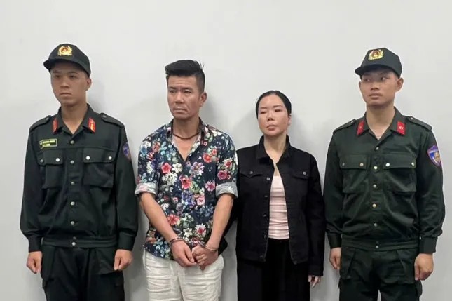 Vợ chồng Nguyễn Thị Mai Anh - Lê Văn Đông tại cơ quan Công an.
