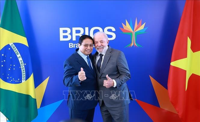 Thủ tướng Phạm Minh Chính và Tổng thống Cộng hòa Liên bang Brazil Lula da Silva. Ảnh: TTXVN. 
