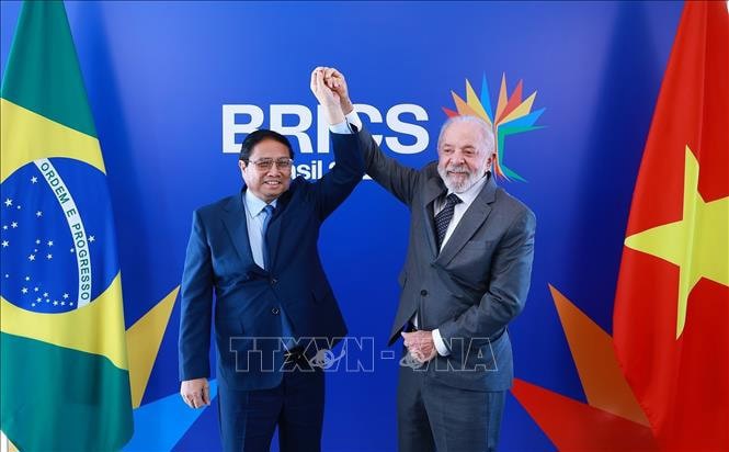 Thủ tướng Phạm Minh Chính và Tổng thống Cộng hòa Liên bang Brazil Lula da Silva. Ảnh: TTXVN. 