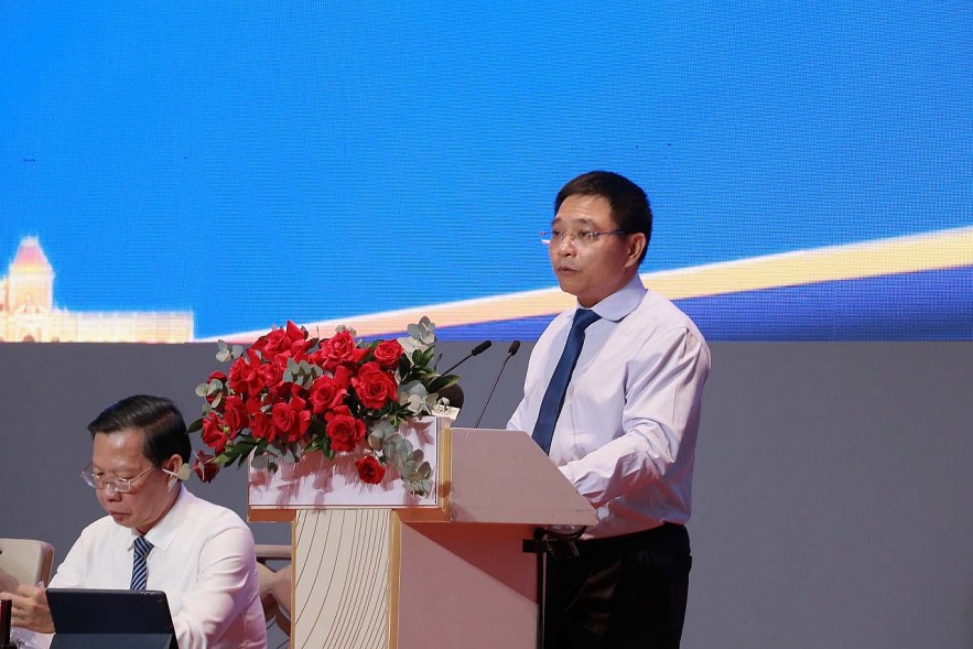 Bộ trưởng Bộ Tài chính Nguyễn Văn Thắng công bố quyết định của Thủ tướng về thành lập Ban chỉ đạo quốc gia về Trung tâm tài chính quốc tế tại Việt Nam. Ảnh: VGP