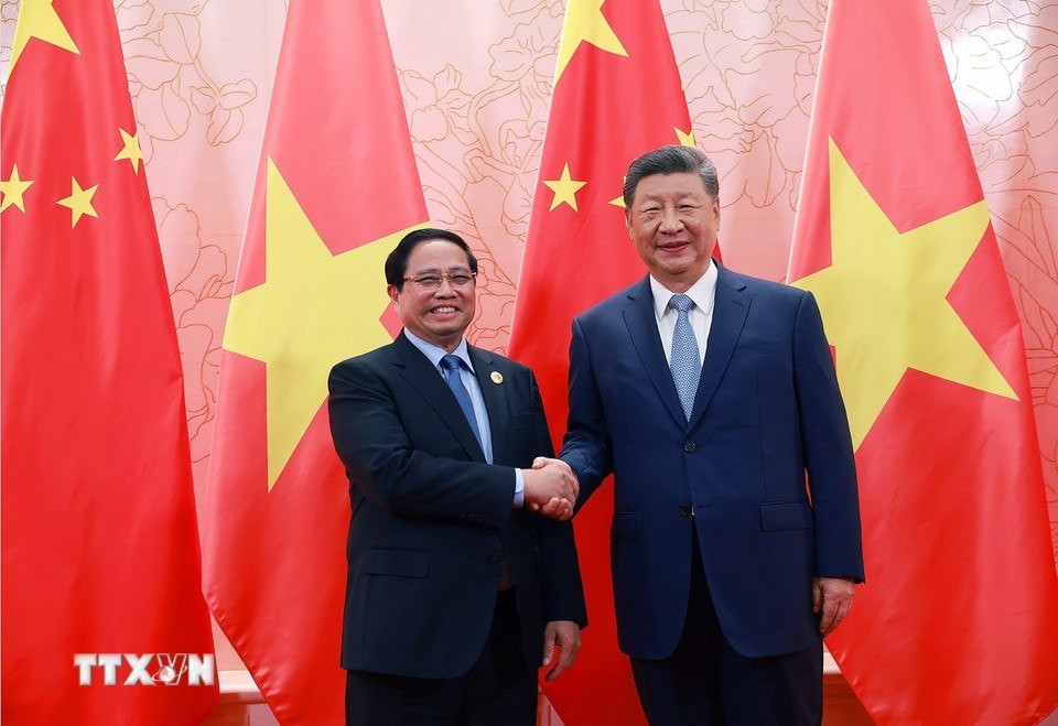 Thủ tướng Phạm Minh Chính hội kiến Tổng Bí thư, Chủ tịch nước Trung Quốc Tập Cận Bình. Ảnh: Dương Giang/TTXVN. 