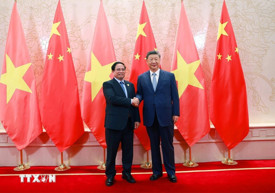 Thủ tướng Phạm Minh Chính hội kiến Tổng Bí thư, Chủ tịch nước Trung Quốc Tập Cận Bình. Ảnh: Dương Giang/TTXVN. 