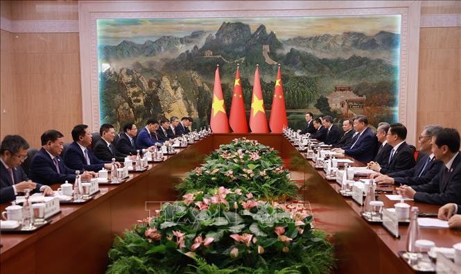 Thủ tướng Phạm Minh Chính hội kiến Tổng Bí thư, Chủ tịch nước Trung Quốc Tập Cận Bình. Ảnh: Dương Giang/TTXVN. 