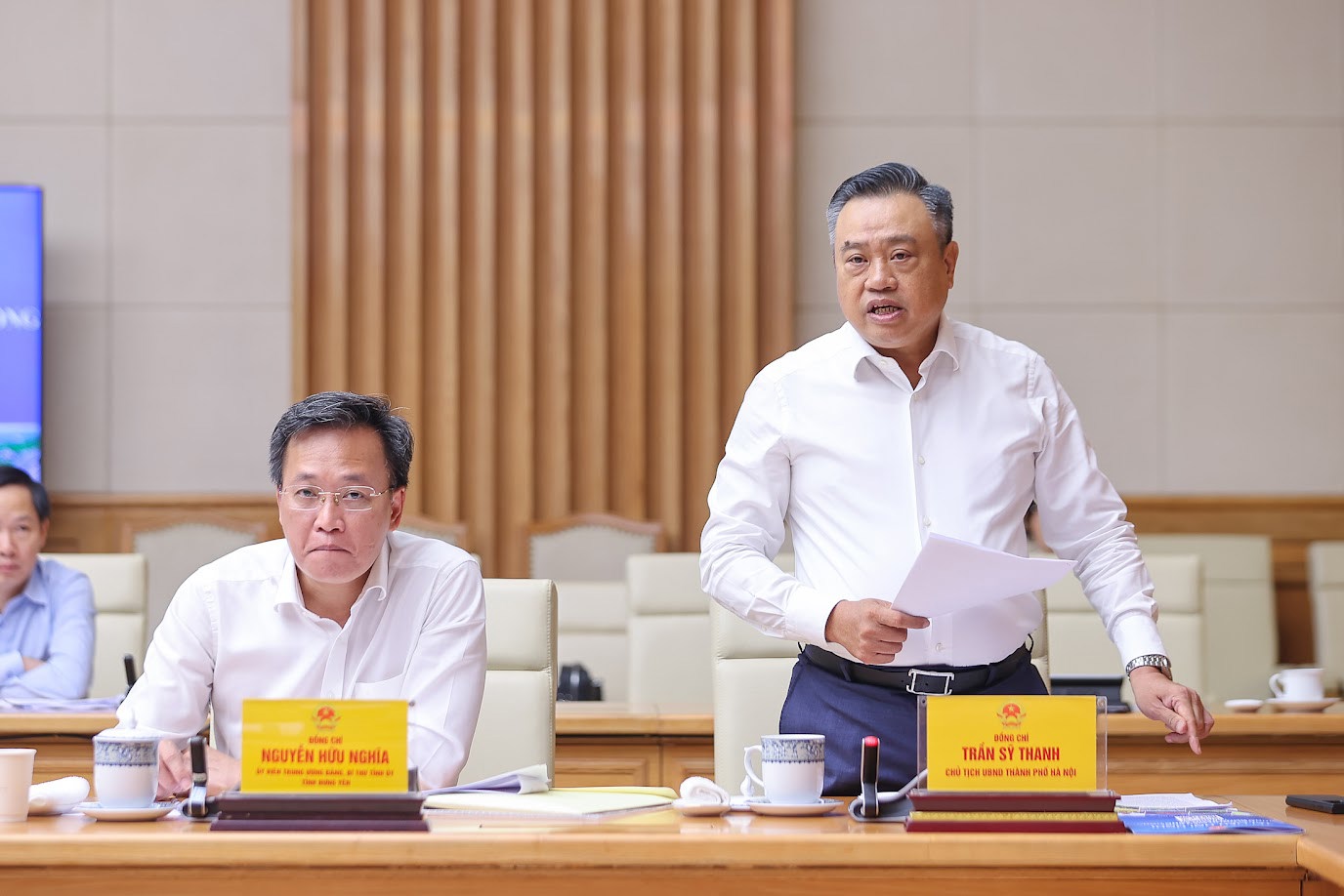 Chủ tịch UBND Th&agrave;nh phố H&agrave; Nội Trần Sỹ Thanh b&aacute;o c&aacute;o tại Hội nghị. Ảnh: VGP/Nhật Bắc