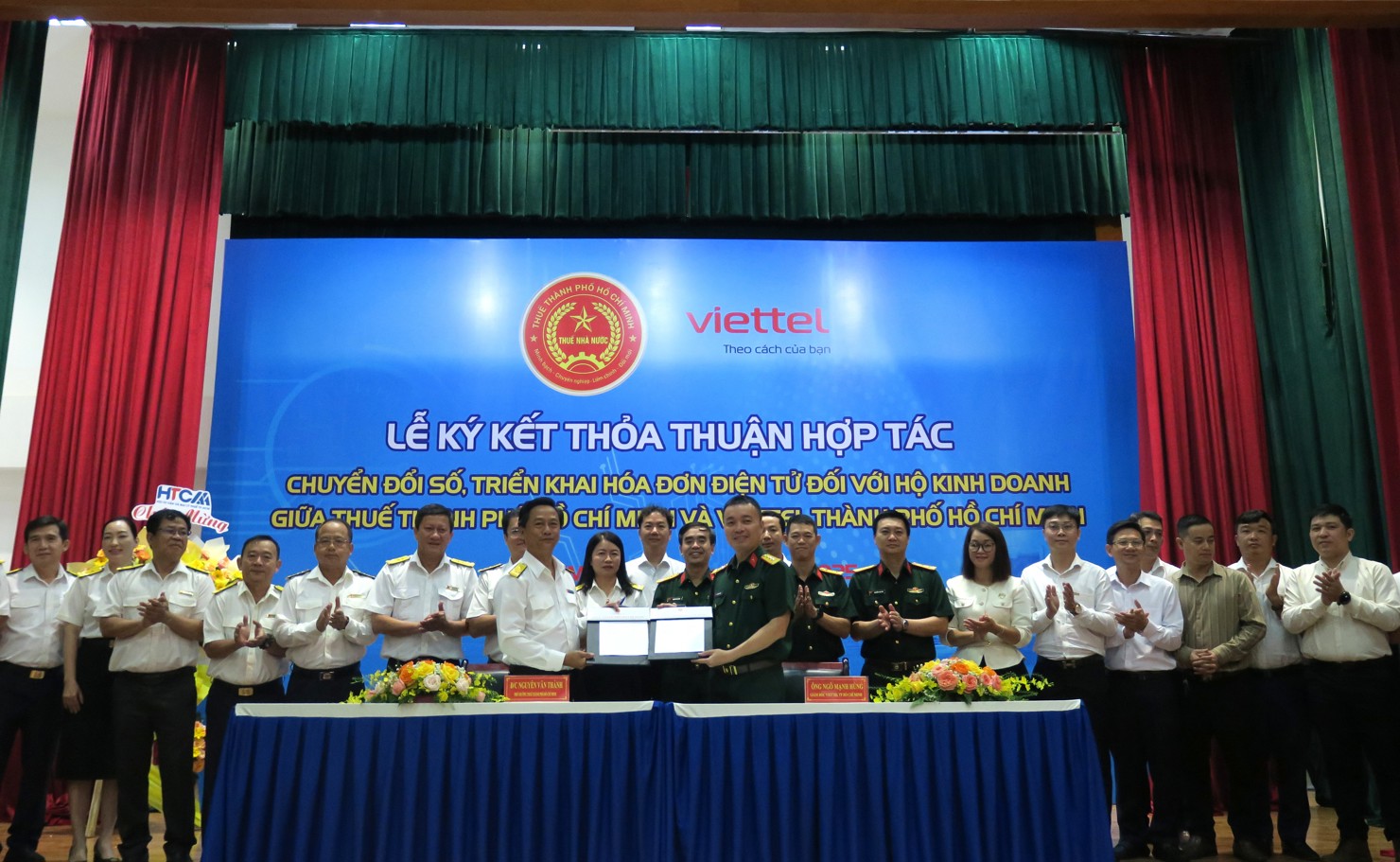 Thuế TP. Hồ Ch&iacute; Minh&nbsp;tiếp tục tăng cường phối hợp t&aacute;c với c&aacute;c đơn vị li&ecirc;n quan hỗ trợ HKD&nbsp;trong qu&aacute; tr&igrave;nh chuyển đổi số. Ảnh: Đức Mỹ