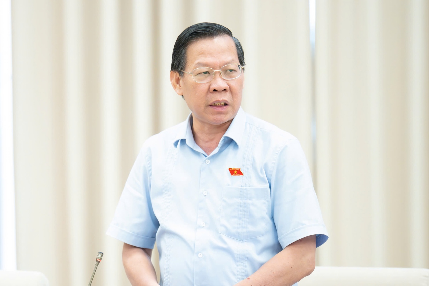 Chủ nhiệm Ủy ban Kinh tế v&agrave; T&agrave;i ch&iacute;nh Phan Văn M&atilde;i b&aacute;o c&aacute;o thẩm tra Dự &aacute;n Luật.