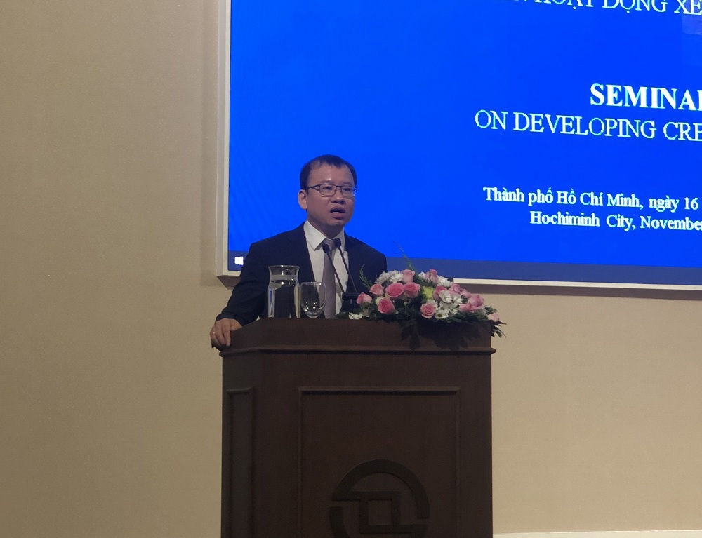 Ông Nguyễn Hoàng Dương, Phó vụ trưởng Vụ Tài chính các ngân hàng và tổ chức tài chính, Bộ Tài chính phát biểu tại hội thảo. Ảnh: Thanh Sơn