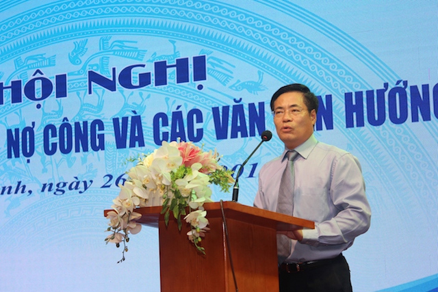 Ông Trương Hùng Long, Cục trưởng Cục Quản lý nợ và tài chính đối ngoại phát biểu tại Hội nghị.