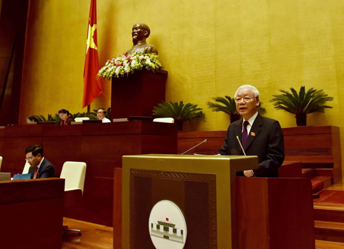 Tổng Bí thư, Chủ tịch nước Nguyễn Phú Trọng trình bày Tờ trình về việc đề nghị Quốc hội phê chuẩn Hiệp định CPTPP. Ảnh: VGP/Nhật Bắc.