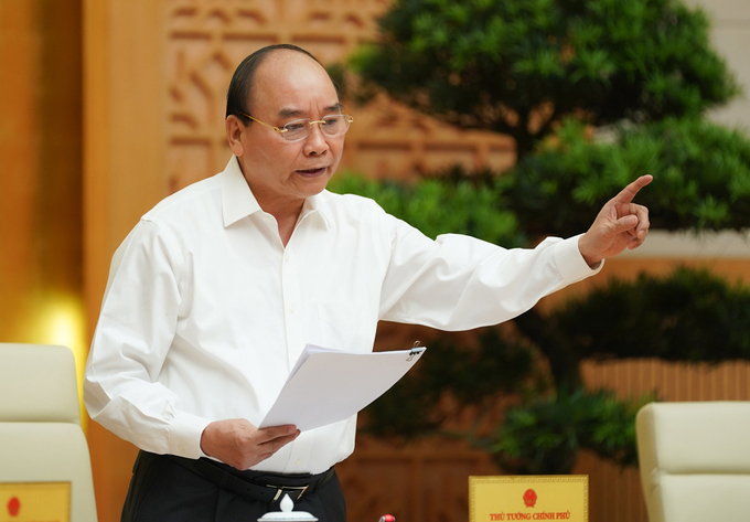 Thủ tướng Nguyễn Xuân Phúc chủ trì cuộc họp với các bộ, ngành địa phương về đẩy nhanh giải ngân đầu tư công, ngày 16/7. Nguồn: chinhphu.vn