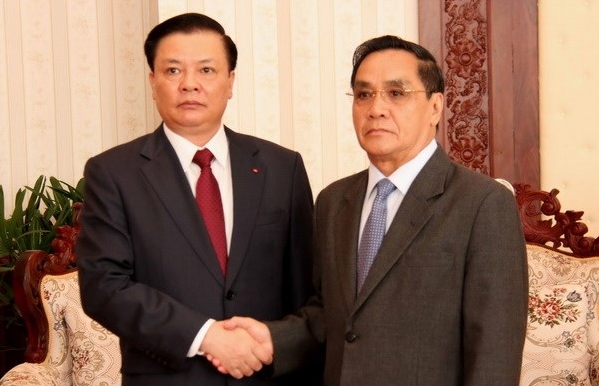 Thủ tướng Lào Thongsing Thammavong tiếp Bộ trưởng Tài chính Đinh Tiến Dũng. Nguồn: vietnamplus.vn