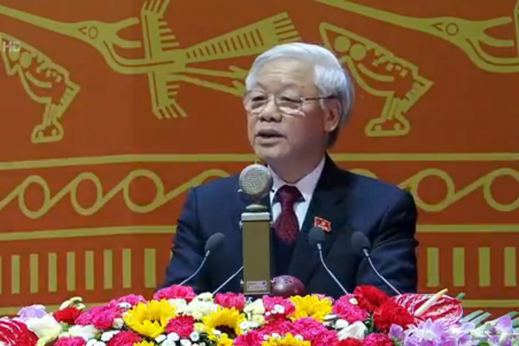 Tổng Bí thư Ban chấp hành Trung ương khóa XI trình bày Báo cáo Chính trị.