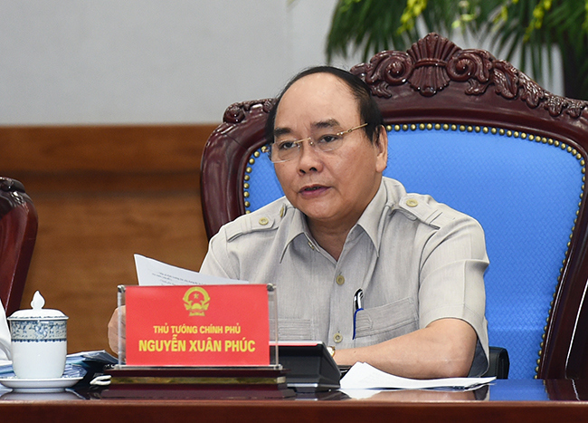 Thủ tướng Nguyễn Xuân Phúc: Đừng coi doanh nghiệp là đối tượng quản lý mà là đối tượng phục vụ - Ảnh: VGP/Quang Hiếu  