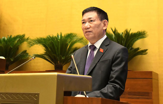 Bộ trưởng Bộ Tài chính Hồ Đức Phớc trình bày tờ trình của Chính phủ về quyết toán NSNN năm 2019.