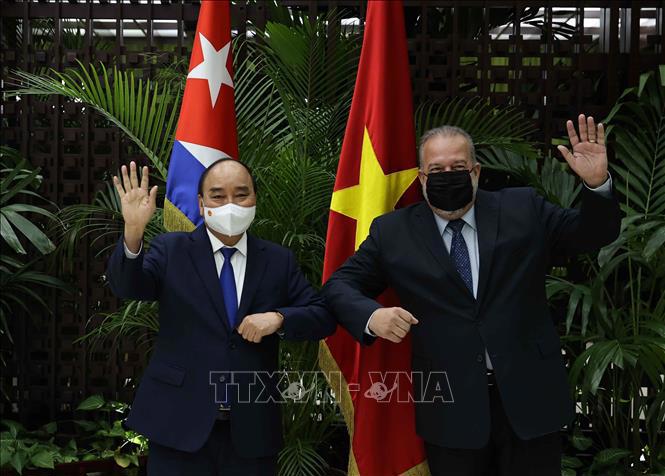 Chủ tịch nước Nguyễn Xuân Phúc và Thủ tướng Cuba Manuel Marrero Cruz.