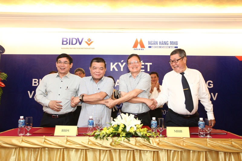 BIDV và MHB ký kết biên bản bàn giao toàn hệ thống và công bố sáp nhập MHB vào BIDV. Nguồn: bidv.com.vn