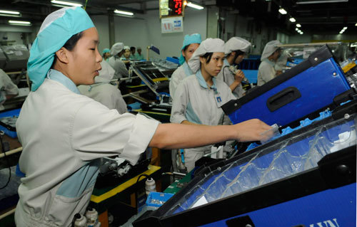 Sản xuất thiết bị điện tử tại Công ty Canon Việt Nam. Nguồn: hanoimoi.com.vn