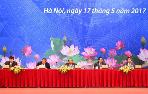 Thủ tướng Nguyễn Xuân Phúc và các Phó Thủ tướng tham dự tại Hội nghị “Đồng hành cùng doanh nghiệp”. Nguồn: chinhphu.vn