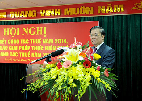 Bộ trưởng Bộ Tài chính Đinh Tiến Dũng phát biểu tại Hội nghị tổng kết công tác thuế năm 2014, triển khai nhiệm vụ, kế hoạch năm 2015. Nguồn: financeplus.vn