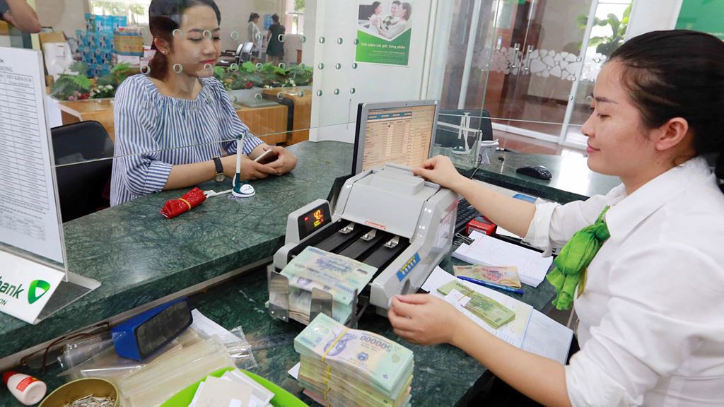 Vietcombank tăng vốn điều lệ lên xấp xỉ 37,1 nghìn tỷ đồng sau khi hoàn tất phát hành cổ phiếu riêng lẻ cho đối tác ngoại. Ảnh: Việt Trần