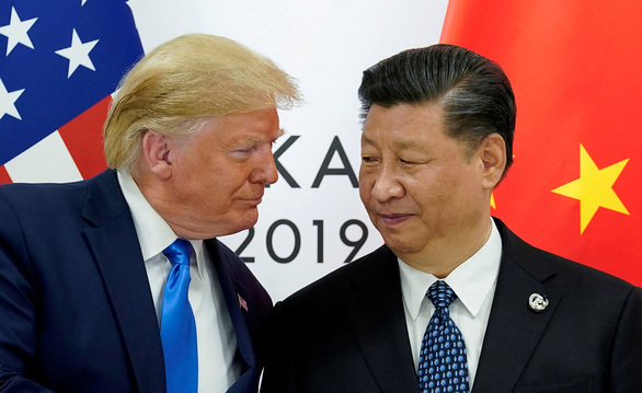  Tổng thống Mỹ Donald Trump (trái) gặp Chủ tịch Trung Quốc Tập Cận Bình tại hội nghị thượng đỉnh G20 ở Osaka, Nhật Bản hồi tháng 6/2019 - Ảnh: REUTERS 