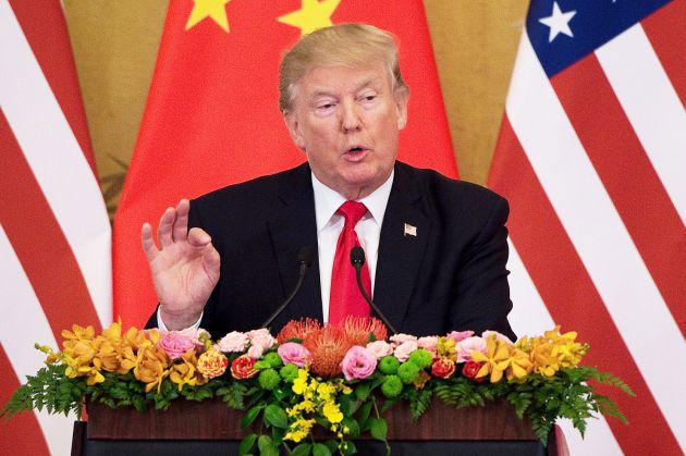  Tổng thống Mỹ Donald Trump tại một cuộc họp báo ở Trung Quốc vào tháng 11/2017. Ảnh Nicholas Asfouri/AFP/Getty Images 