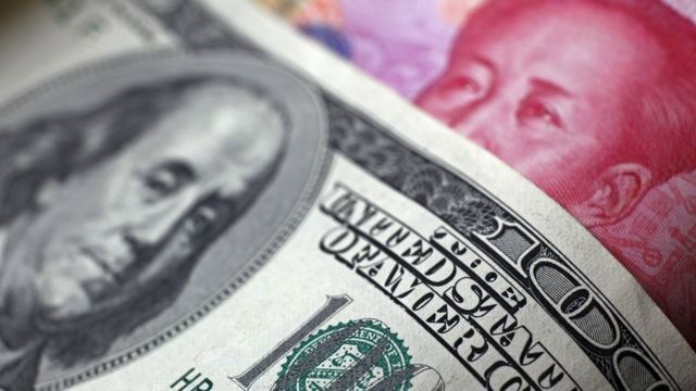 Đồng USD đang giúp Mỹ có nhiều lợi thế trước Trung Quốc trong cuộc chiến thương mại-tiền tệ. Ảnh Reuters