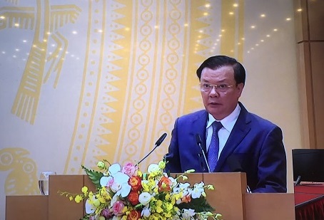 Bộ trưởng Bộ Tài chính Đinh Tiến Dũng trình bày báo cáo tại hội nghị. Ảnh: TBTCVN