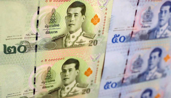  Năm nay, đồng Baht Thái Lan đã tăng giá 7%, mạnh hơn bất kỳ đồng tiền nào của các nền kinh tế mới nổi ở khu vực châu Á - Ảnh: Reuters/Nikkei 