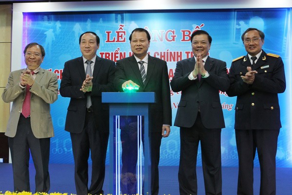 Phó Thủ tướng Vũ Văn Ninh nhấn nút chính thức triển khai Cơ chế một cửa quốc gia. Nguồn: internet