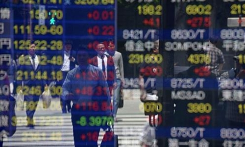  Các thị trường châu Á sáng nay đồng loạt đi lên. Ảnh: AFP