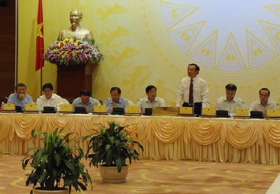 Bộ trưởng, Chủ nhiệm Văn phòng Chính phủ Nguyễn Văn Nên chủ trì buổi họp báo Chính phủ thường kỳ tháng 7/2014. Ảnh: Văn Trường
