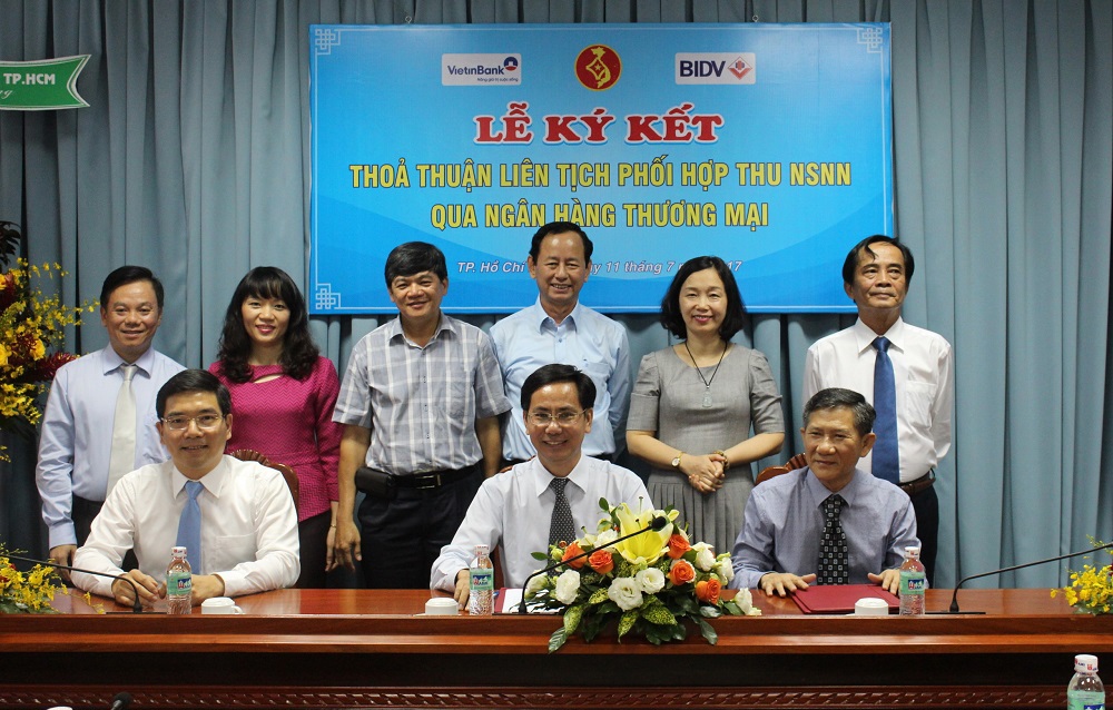 Đại diện BIDV va KBNN ký Thỏa thuận liên tịch phối hợp thu NSNN trên địa bàn TP. Hồ Chí Minh.