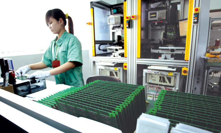 Sản xuất bo mạch điện tử của một doanh nghiệp Đức tại Khu chế xuất Tân Thuận. Nguồn: Internet