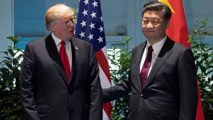 Tổng thống Mỹ Donald Trump (trái) và Chủ tịch Trung Quốc Tập Cận Bình tại cuộc gặp bên lề thượng đỉnh G20, tháng 7/2017 - Ảnh: Reuters.