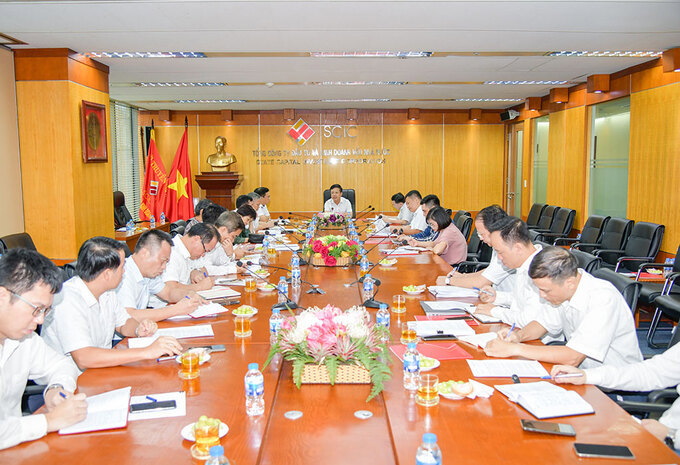 Phó Chủ tịch Ủy ban Quản lý vốn nhà nước tại doanh nghiệp Hồ Sỹ Hùng làm việc với SCIC.