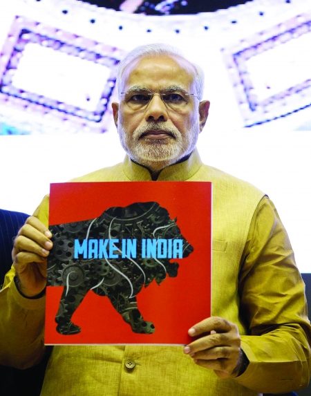 Thủ tướng Ấn Độ Narendra Modi giới thiệu biểu tượng Sáng kiến ”Make in India” tại Thủ đô New Delhi ngày 25/9/2014. Nguồn: internet