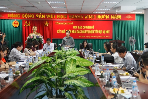 Ông Nguyễn Đại Trí trả lời báo chí tại buổi họp báo. Ảnh: NM.