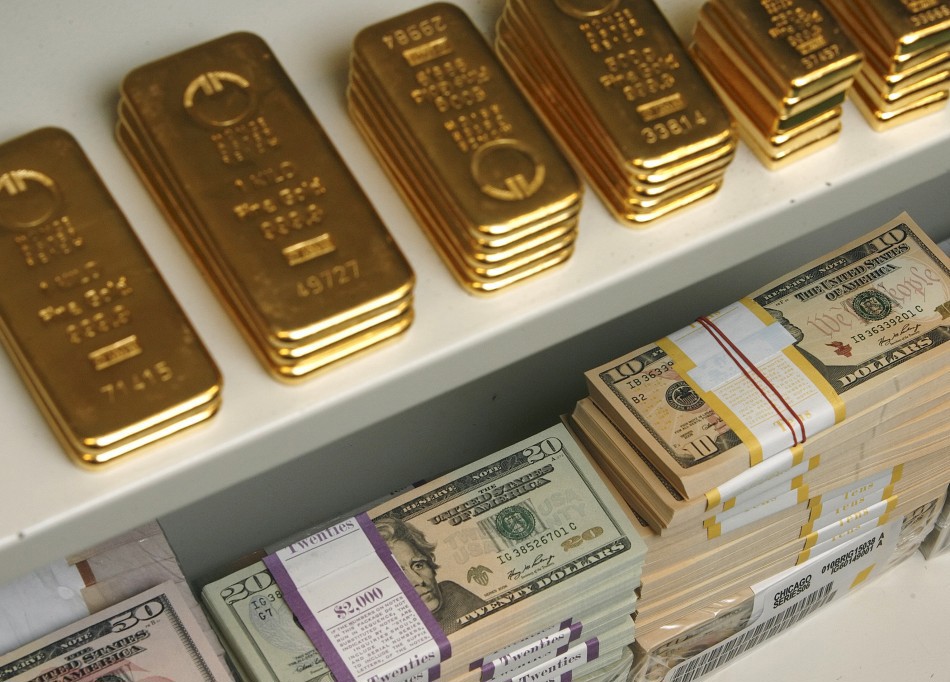 2015: Vàng tiếp đà giảm, USD tăng giá