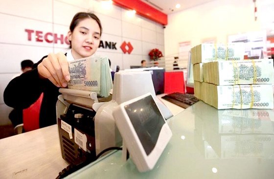 Techcombank là ngân hàng đầu tiên được Ngân hàng Nhà nước cho nới room tín dụng. 